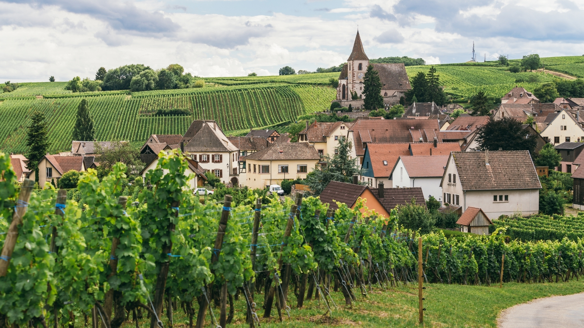 A picturesque rural village set among rolling vineyards, France. 